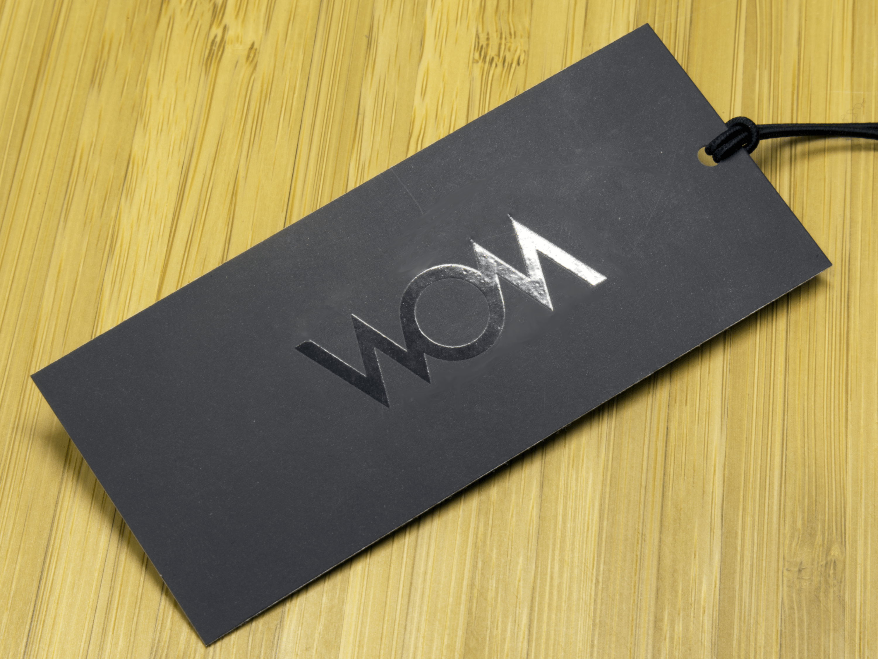 Premium Matt + UV Garment Tags Printing in Greater Noida West photo